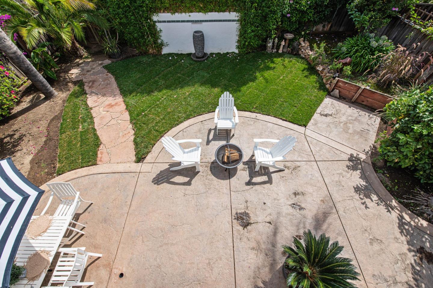 222 North 3rd Street Campbell, CA 95008 - Photo 27 of 35 a view of a backyard with couches plants and large tree