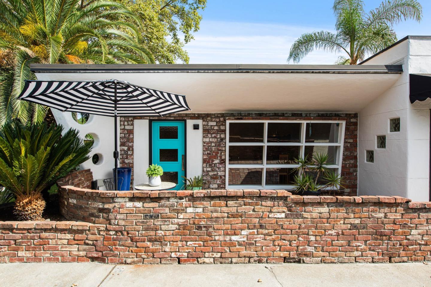 222 North 3rd Street Campbell, CA 95008 - Photo 35 of 35 a front view of a house with a yard and glass windows