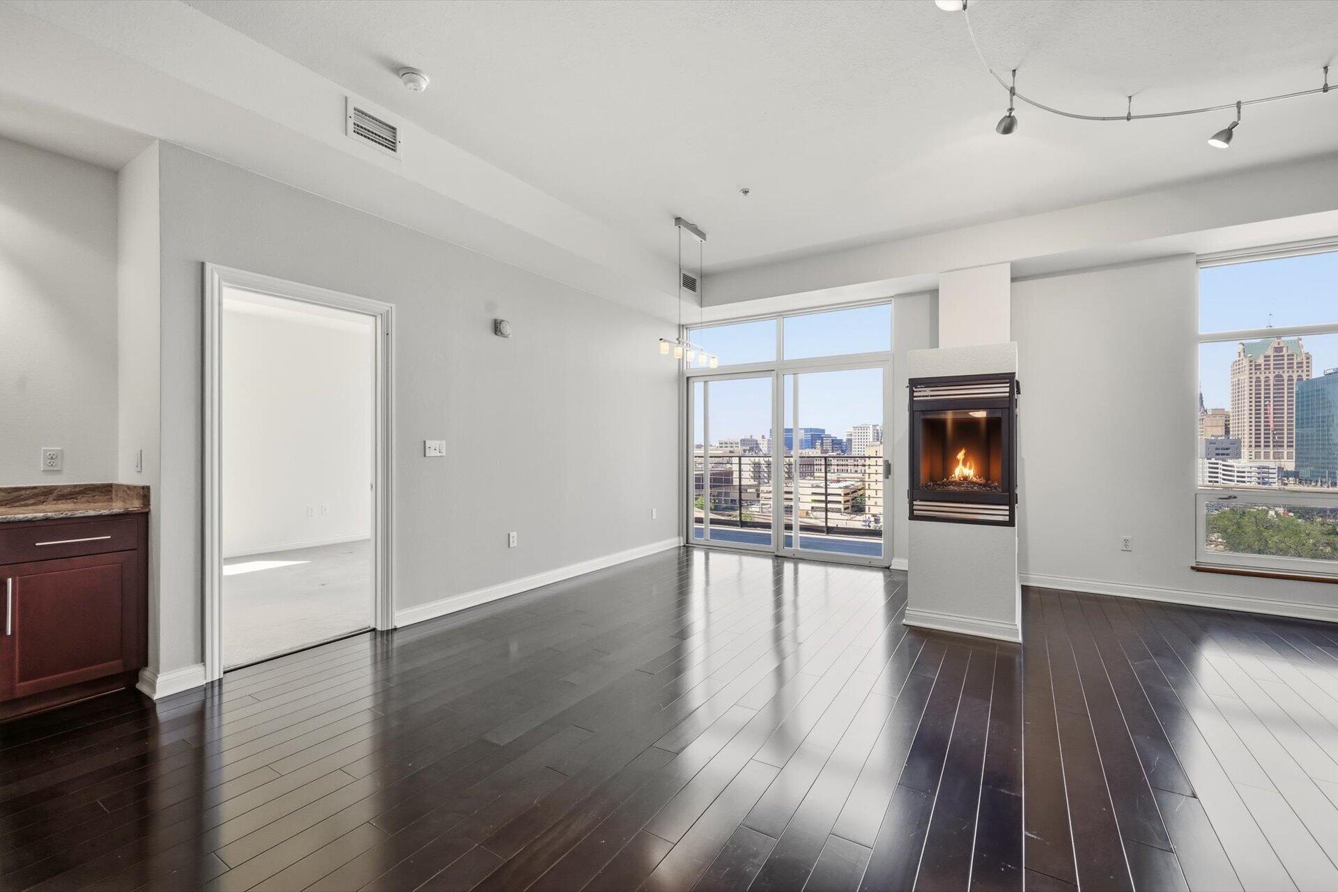 106 West Seeboth Street, Unit 920 Milwaukee, WI 53204 - Photo 14 of 51 Dining Area, Gas Fireplace, Hardwood Floors