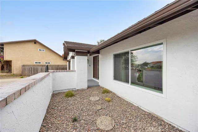 a view of a kitchen with a sink and dishwasher