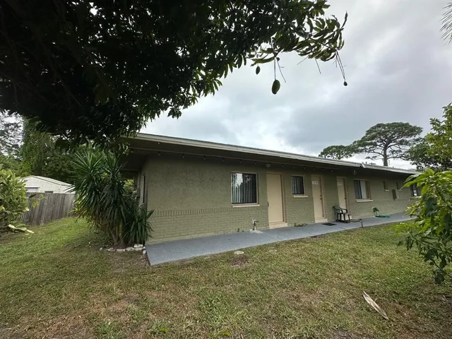 a front view of a house with garage