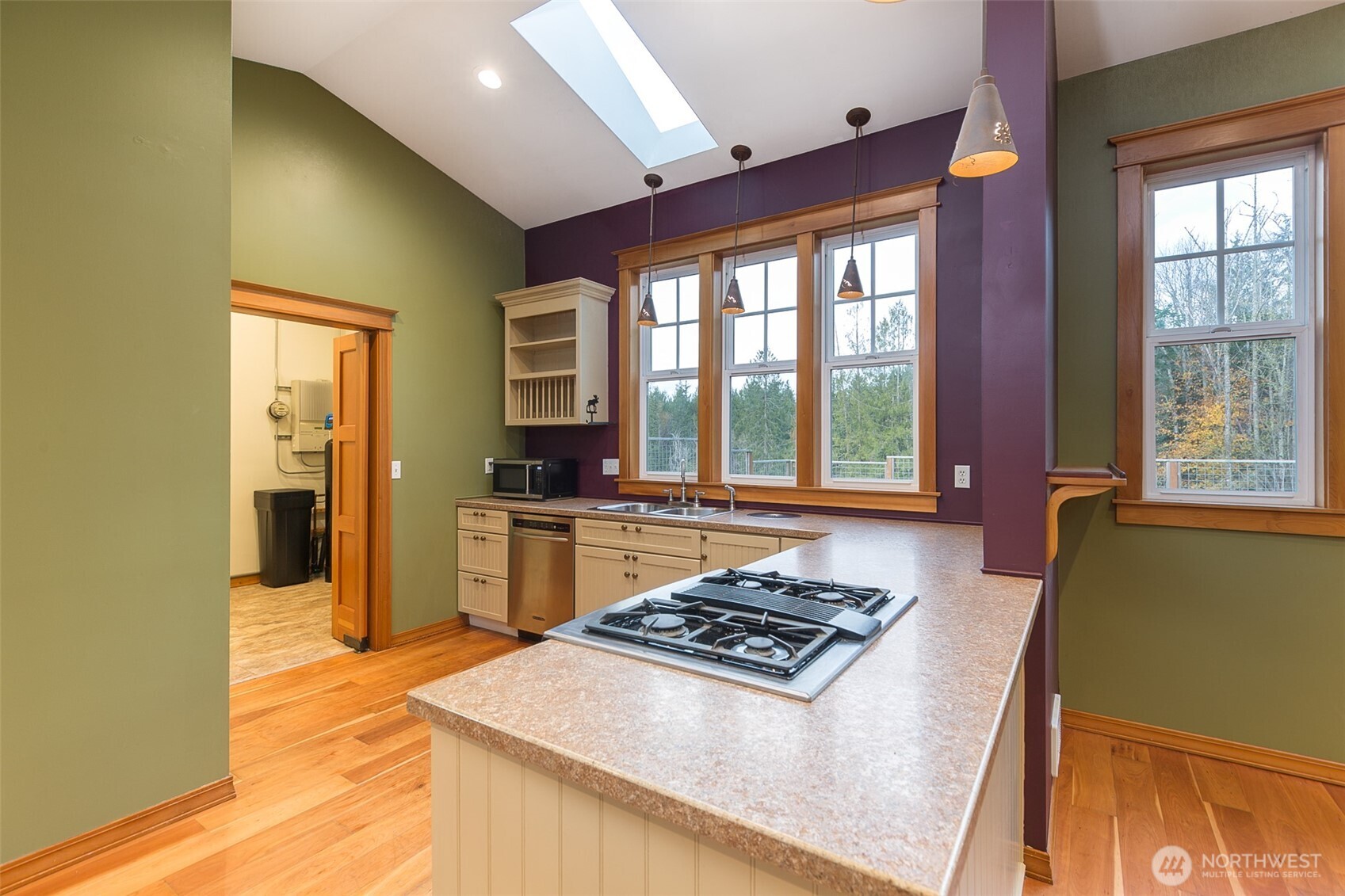 1083 Blyn Springs Road Sequim, WA 98382 - Photo 24 of 40 a kitchen with a stove and a refrigerator