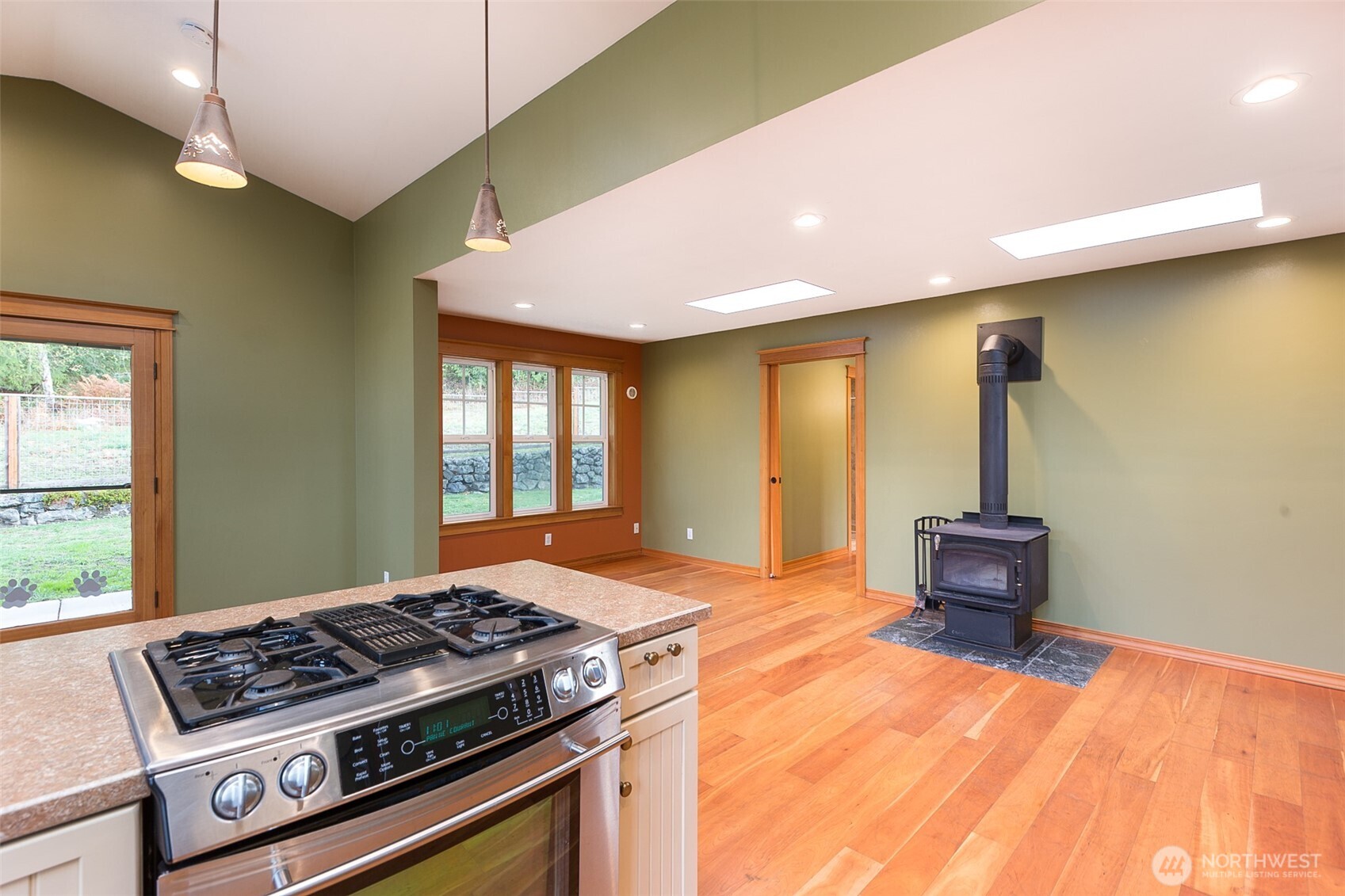 1083 Blyn Springs Road Sequim, WA 98382 - Photo 28 of 40 a kitchen with a stove and a window