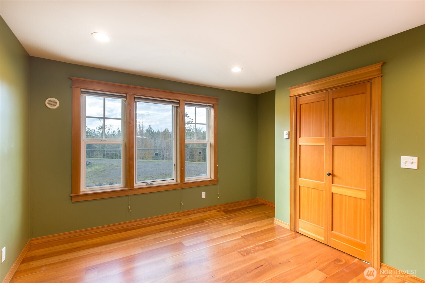 1083 Blyn Springs Road Sequim, WA 98382 - Photo 34 of 40 a view of an empty room and window