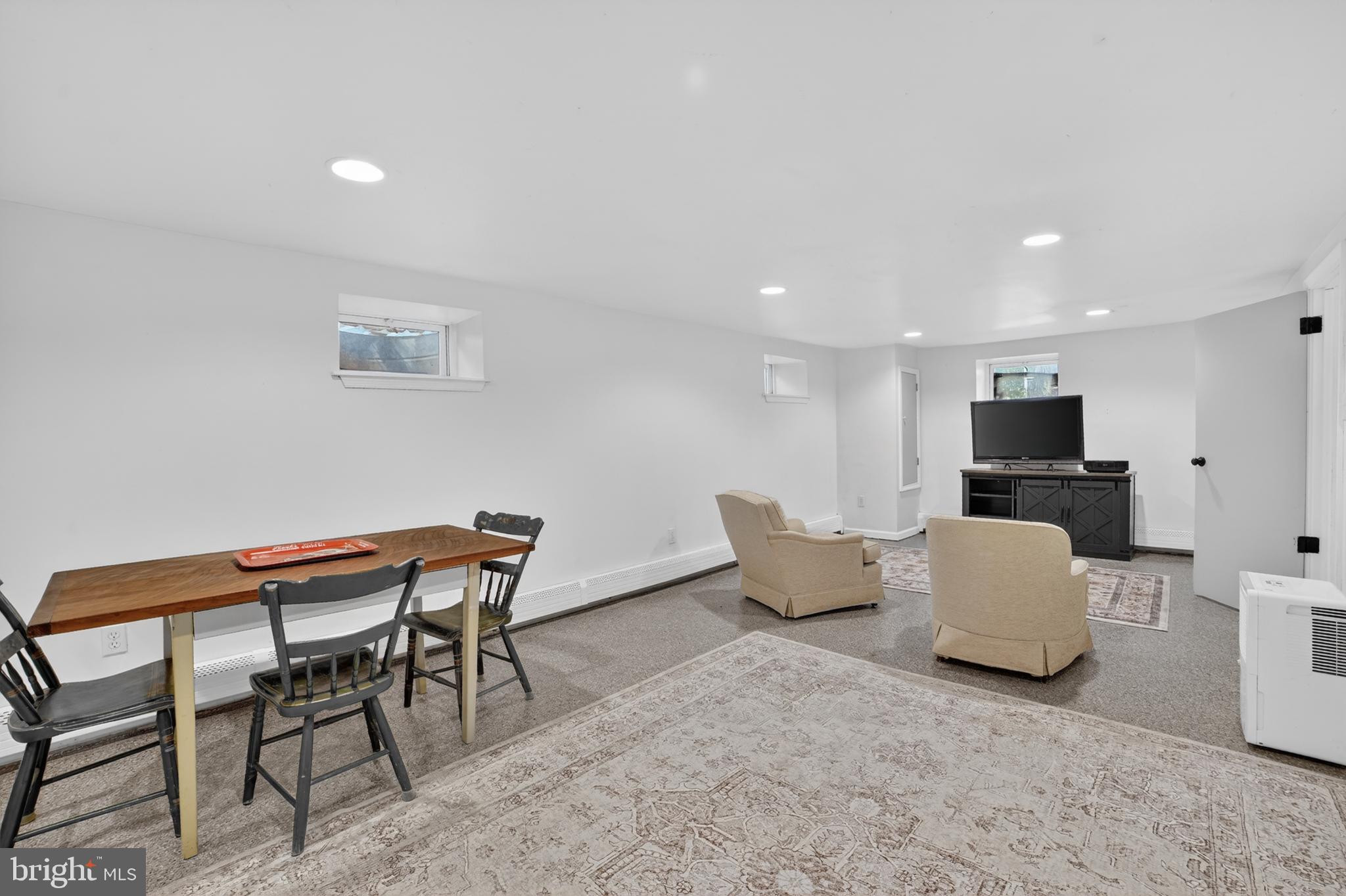 305 Irish Road Berwyn, PA 19312 - Photo 31 of 34 a living room with furniture and a flat screen tv