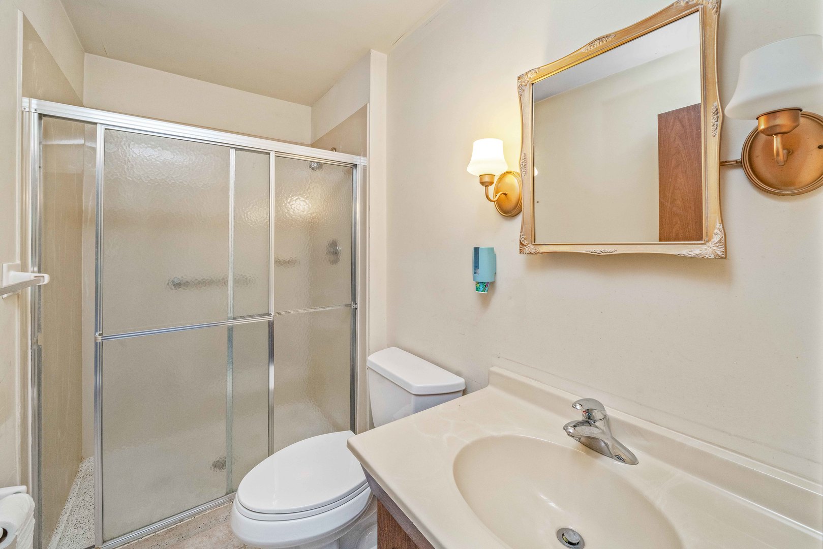 17624 Frazier Road Sandwich, IL 60548 - Photo 12 of 22 a bathroom with a sink toilet and shower