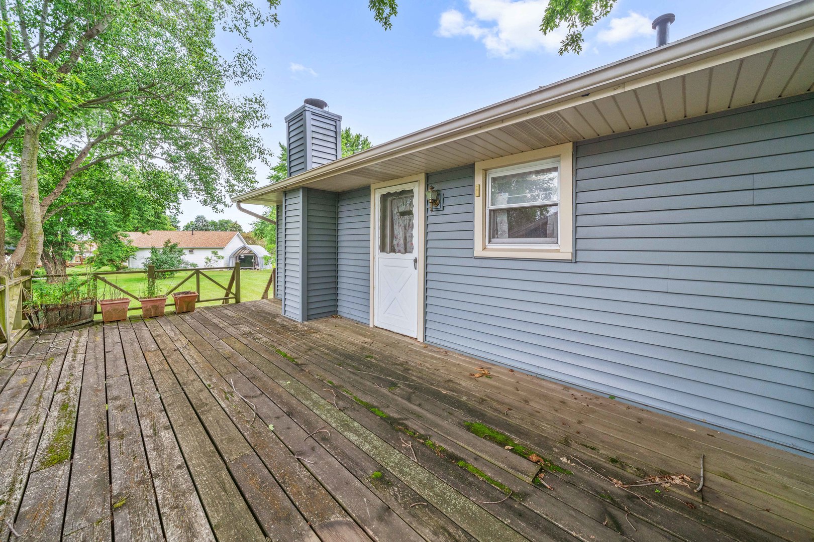 17624 Frazier Road Sandwich, IL 60548 - Photo 19 of 22 a view of backyard with a deck