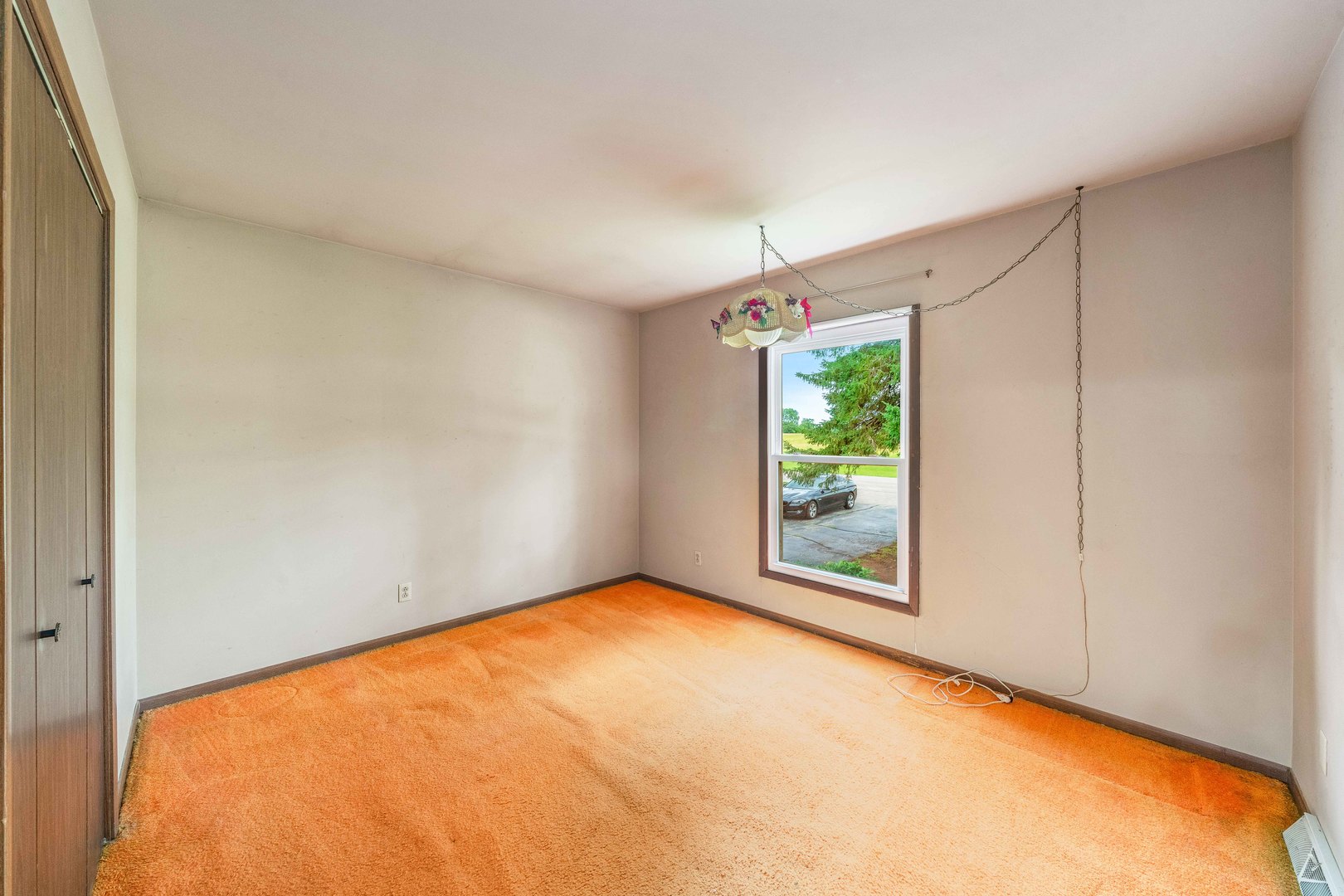 17624 Frazier Road Sandwich, IL 60548 - Photo 10 of 22 a view of an empty room with a window