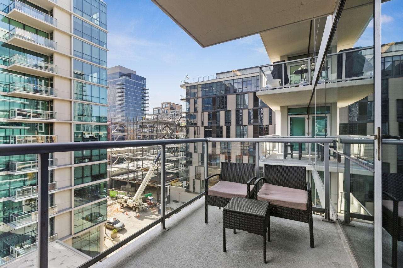 Undisclosed Address Chicago, IL 60607 - Photo 10 of 13 a view of a chairs and table in a balcony