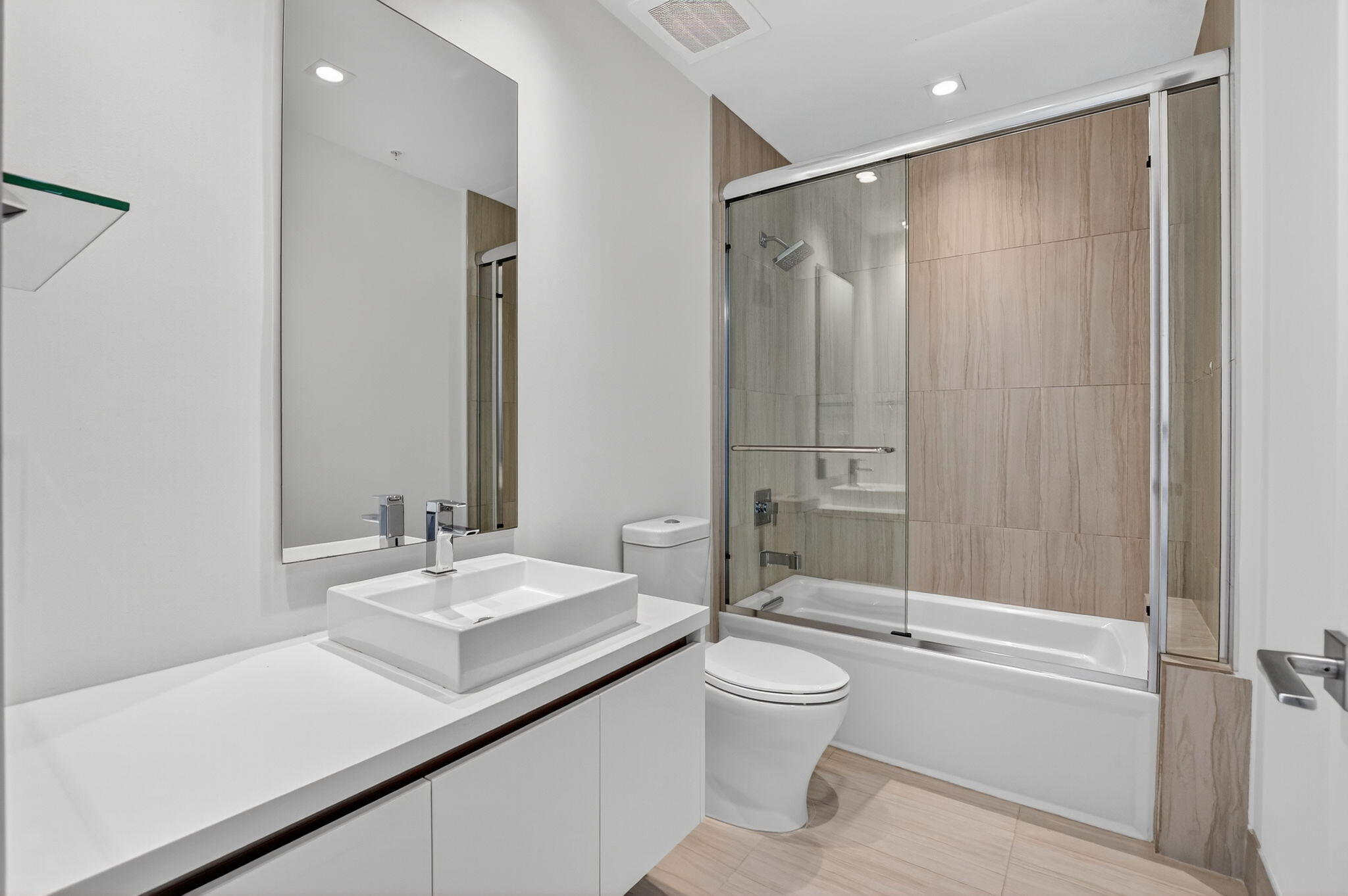 155 East Boca Raton Road, Unit 1014 Boca Raton, FL 33432 - Photo 30 of 62 a bathroom with a sink a toilet and shower