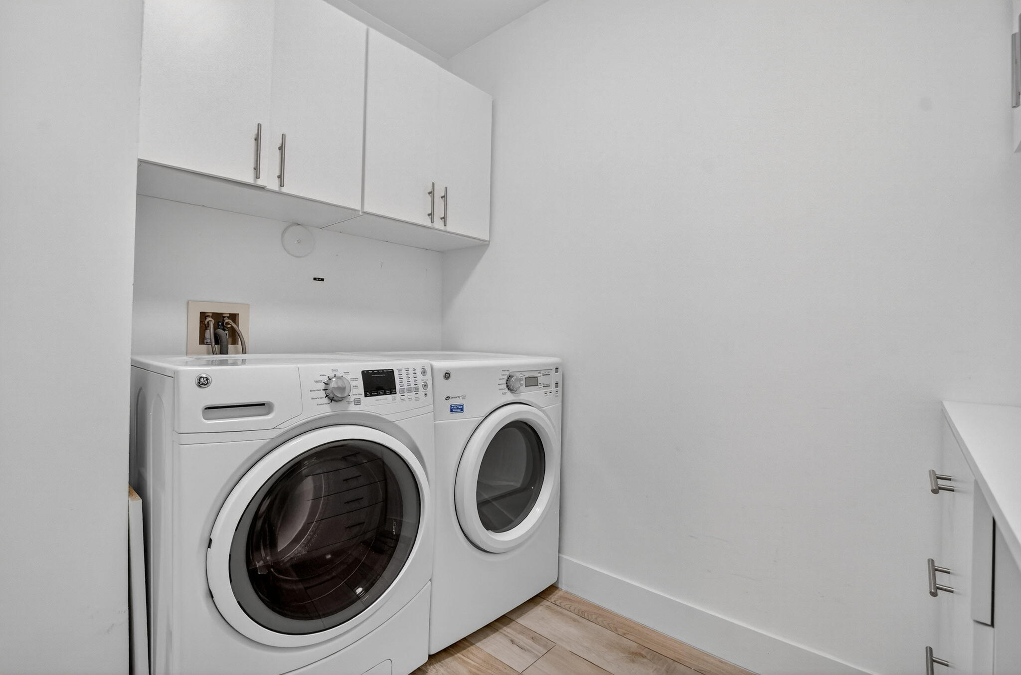 155 East Boca Raton Road, Unit 1014 Boca Raton, FL 33432 - Photo 44 of 62 a utility room with dryer and washer