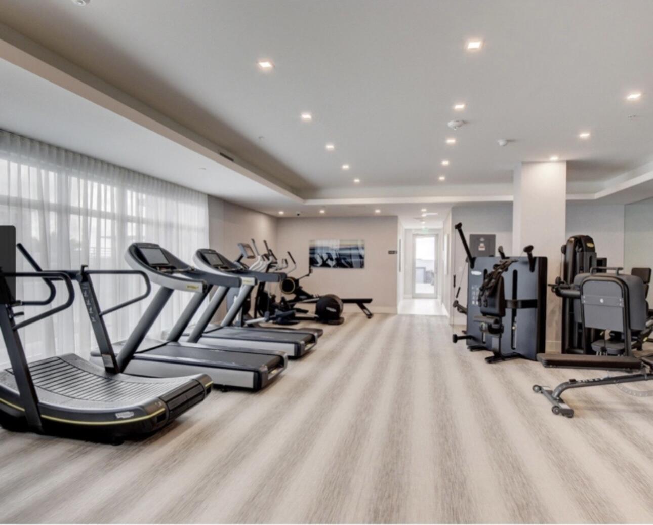 155 East Boca Raton Road, Unit 1014 Boca Raton, FL 33432 - Photo 56 of 62 a view of a room with gym equipment