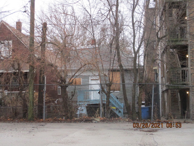 2706 East 78th Street Chicago, IL 60649 - Photo 2 of 10 a view of a brick house with many windows