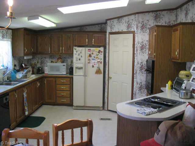 7831 Athens Road Stokesdale, NC 27357 - Photo 2 of 5 Other. Kitchen