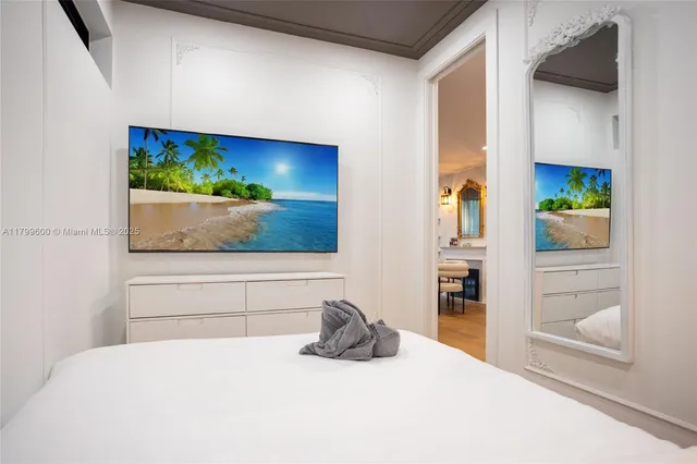 a view of a bath tub sitting in a bedroom
