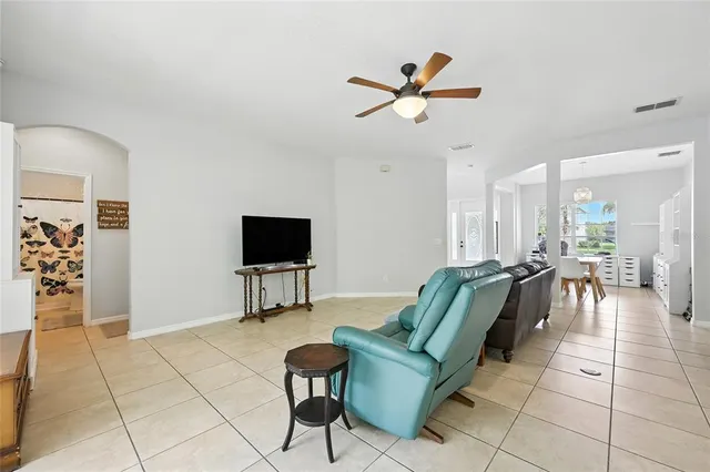 a kitchen with a stove a sink and a refrigerator
