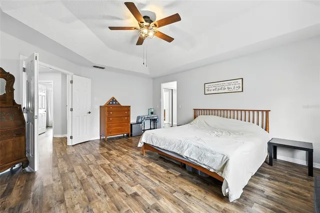a bathroom with a sink a mirror and a shower