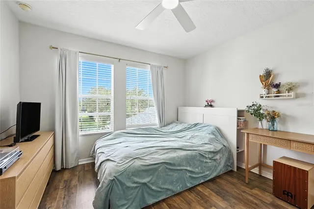 a view of a house couches with a backyard and swimming pool