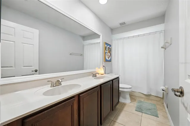 a dining room with furniture and garden view