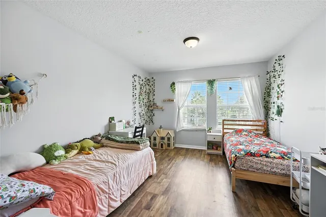 an aerial view of a house with a garden