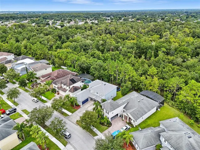 a view of a yard with an outdoor seating