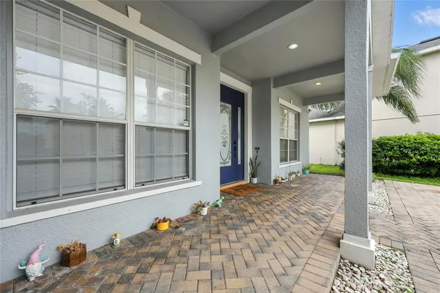 a view of a entryway door front of house