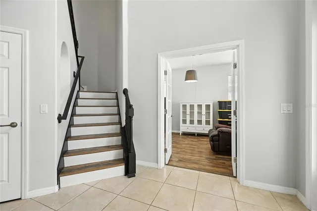 a view of a livingroom with furniture and a flat screen tv