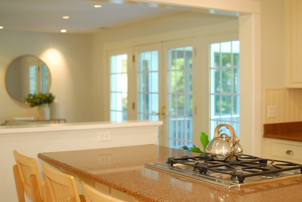 118 Monsen Road Concord, MA 01742 - Photo 13 of 34 a view of a sink a table and a potted plant