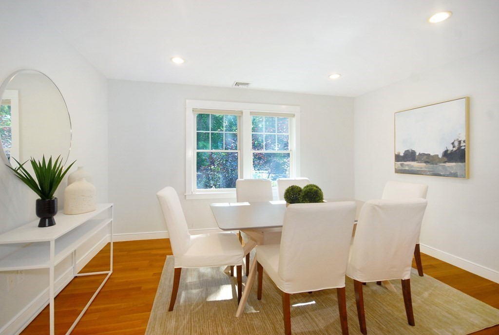 118 Monsen Road Concord, MA 01742 - Photo 14 of 34 a view of a dining room with furniture and wooden floor