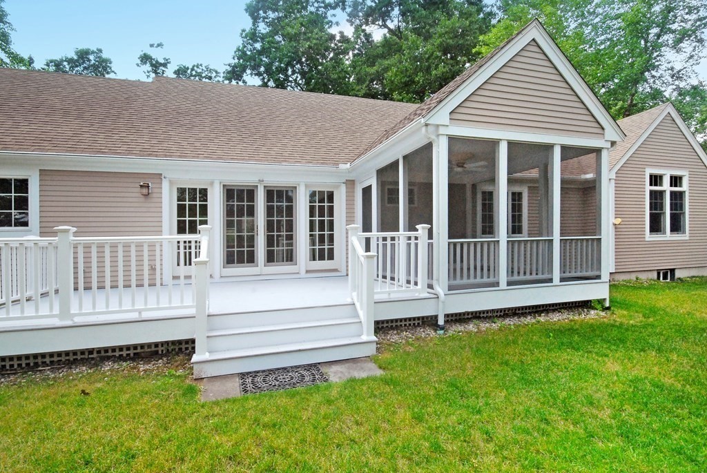 118 Monsen Road Concord, MA 01742 - Photo 29 of 34 a view of a house with a yard and wooden fence