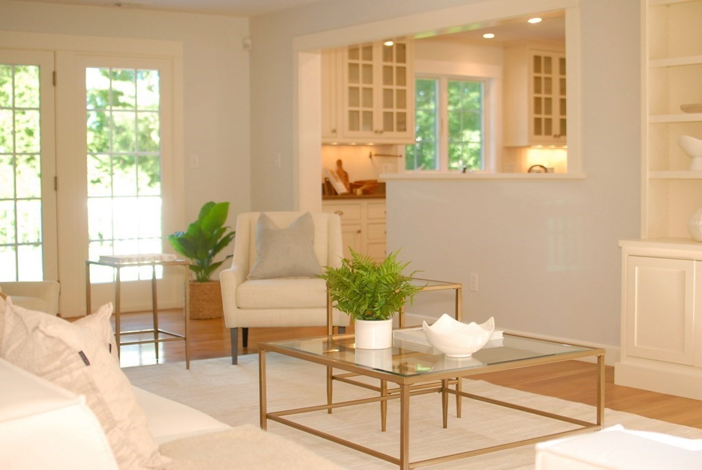 118 Monsen Road Concord, MA 01742 - Photo 6 of 34 a dining room with furniture and a potted plant
