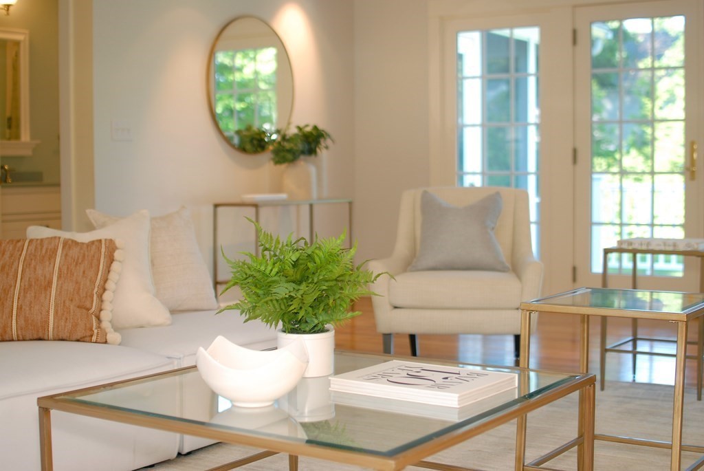 118 Monsen Road Concord, MA 01742 - Photo 8 of 34 a living room with furniture and a potted plant