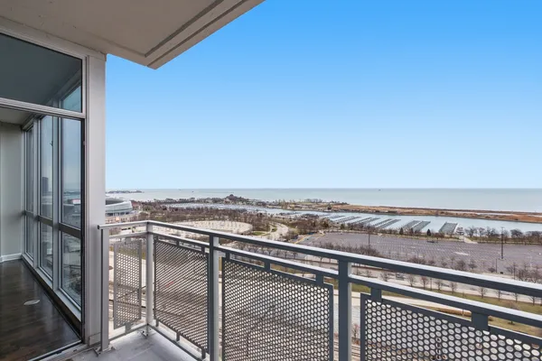 a view of a balcony with city view