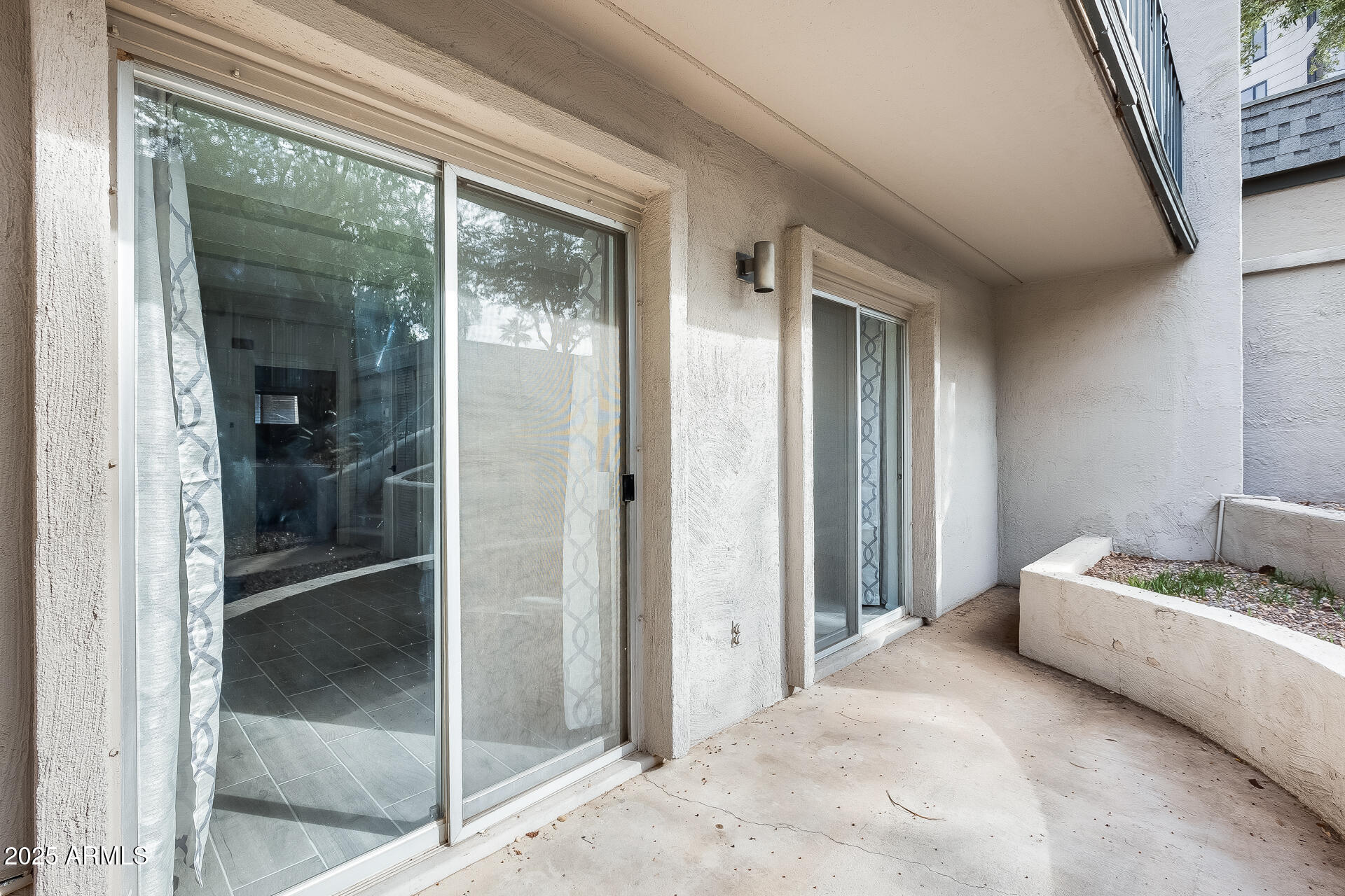 1024 East Osborn Road, Unit A Phoenix, AZ 85014 - Photo 13 of 20 a living room with furniture and a window