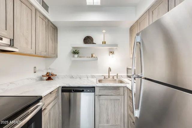 a wooden bench sitting in front of a building