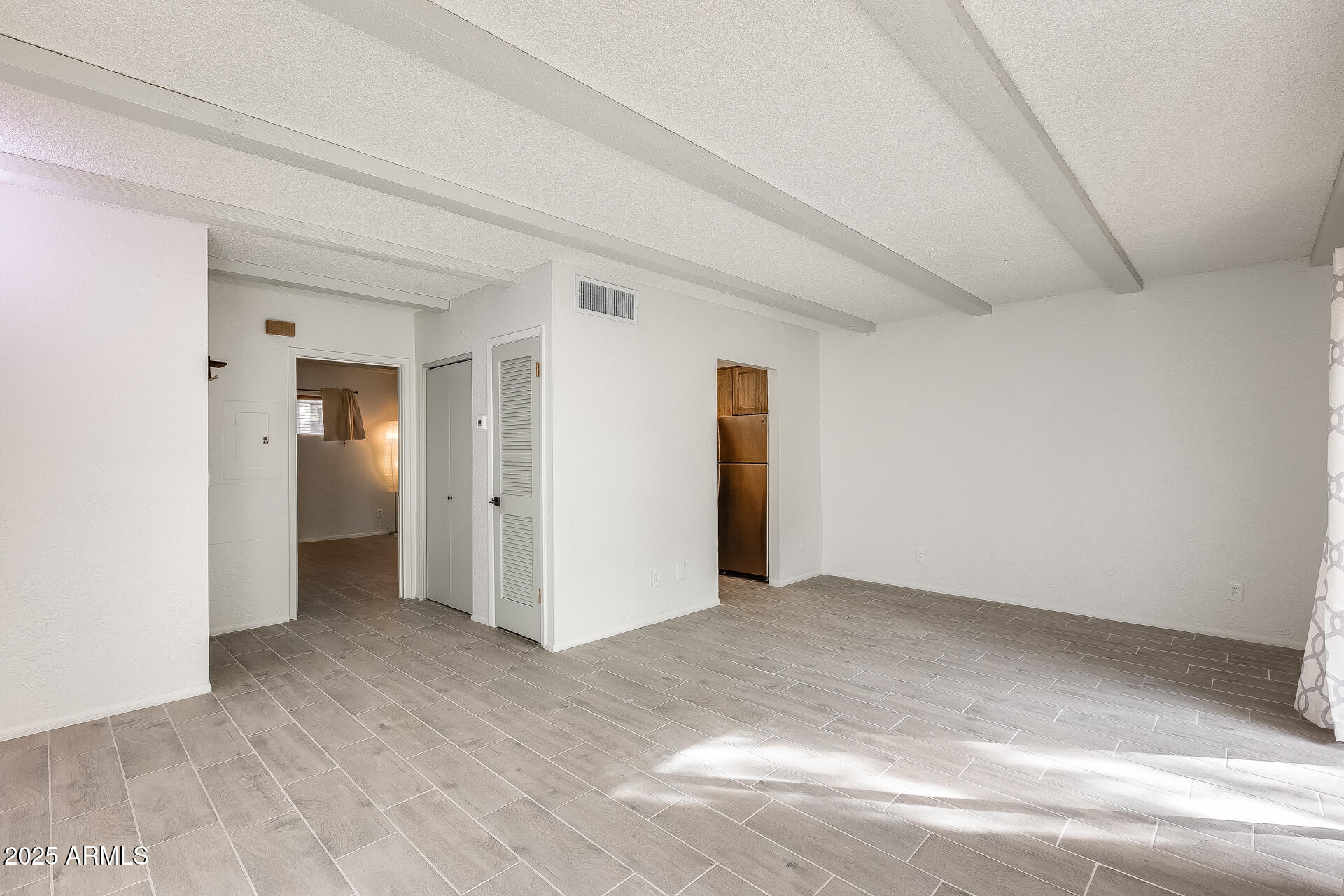 1024 East Osborn Road, Unit A Phoenix, AZ 85014 - Photo 5 of 20 an empty room with closet
