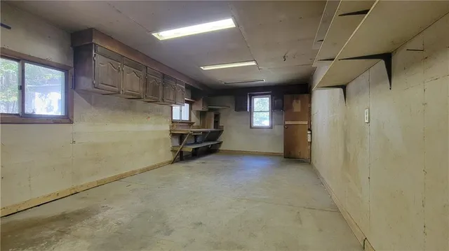 a view of a bench in a backyard