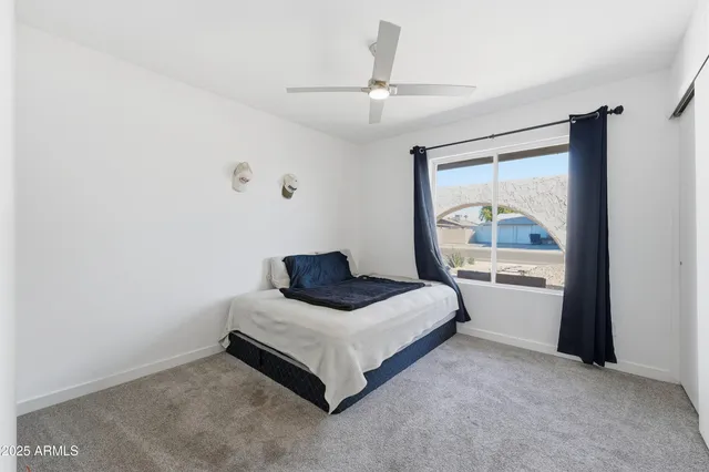 a living room with furniture and window