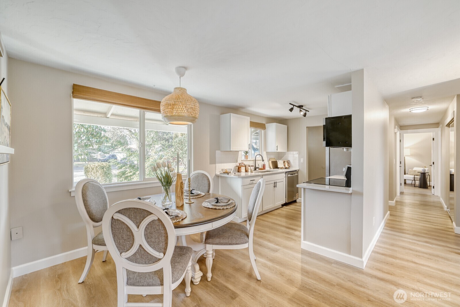 112 Raspberry Lane Sultan, WA 98294 - Photo 8 of 25 a view of a dining room with furniture window and wooden floor