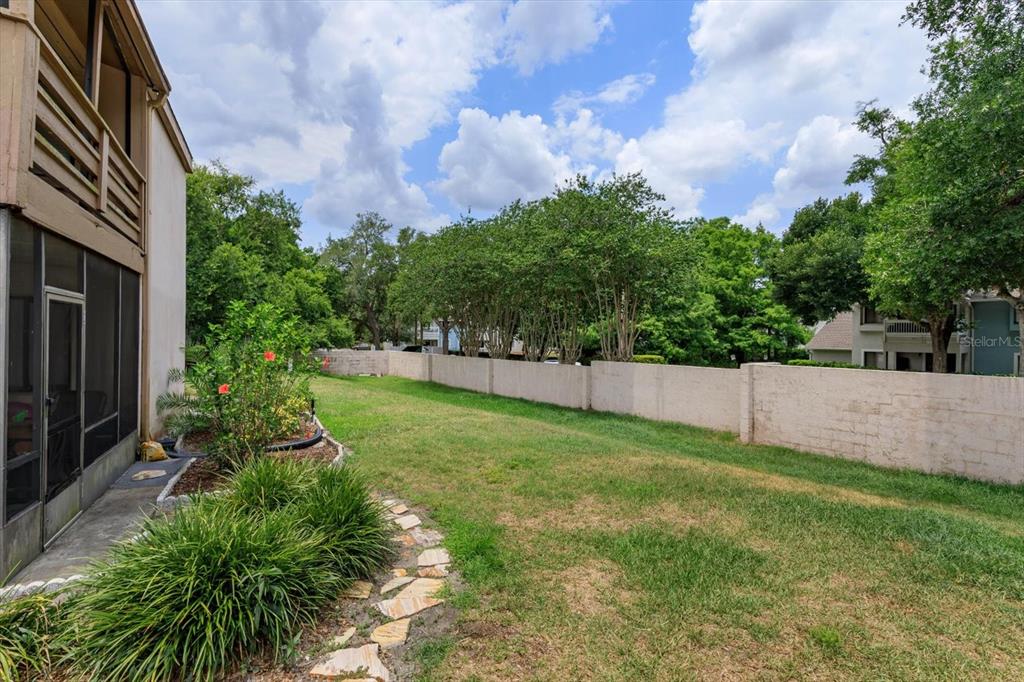 240 Orienta Point Street, Unit 240 Altamonte Springs, FL 32701 - Photo 14 of 20 a view of a back yard