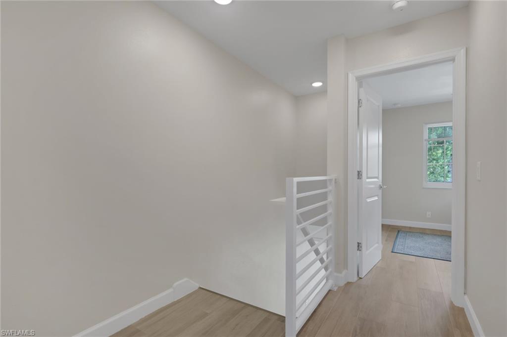 230 3rd Avenue South, Unit 4 Naples, FL 34102 - Photo 11 of 22 wooden floor in a room