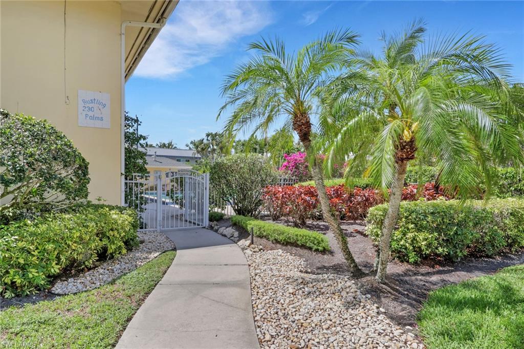 230 3rd Avenue South, Unit 4 Naples, FL 34102 - Photo 16 of 22 a front view of a house