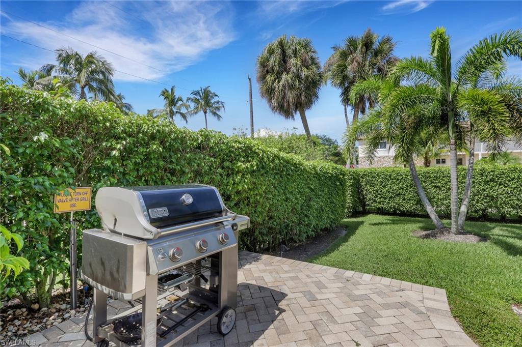 230 3rd Avenue South, Unit 4 Naples, FL 34102 - Photo 18 of 22 a view of a yard with furniture