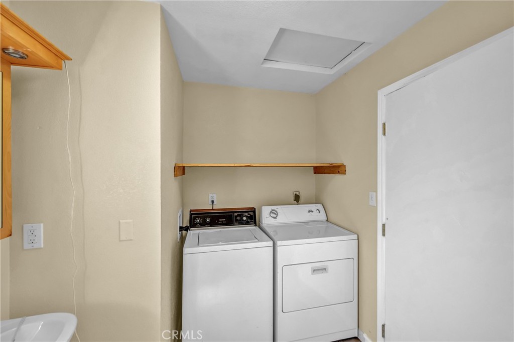 16410 Tish-A-Tang Road Lower Lake, CA 95457 - Photo 35 of 48 a utility room with dryer and washer