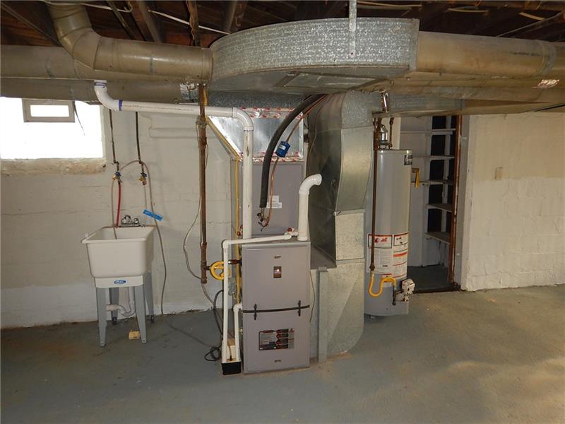 1918 Fox Chapel Road Pittsburgh, PA 15238 - Photo 22 of 24 UTILITY TUB, FURNACE & WATER HEATER
