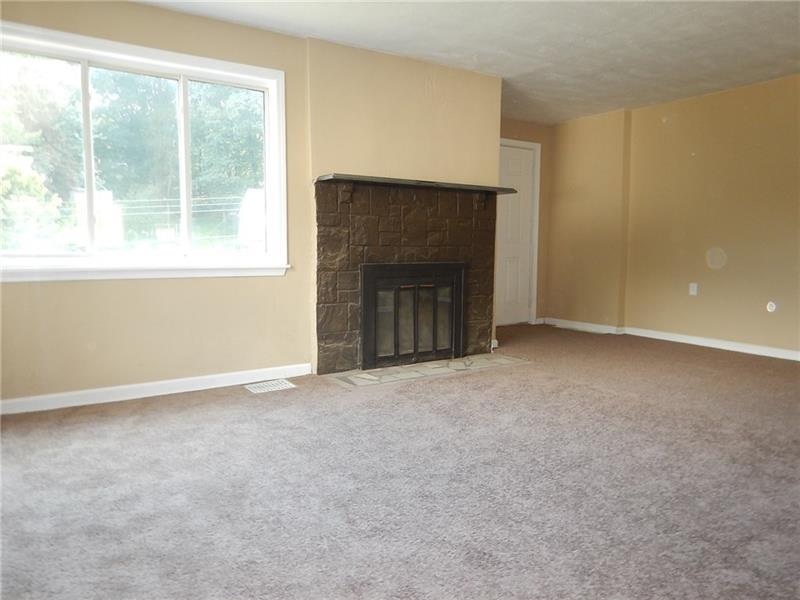 LOTS OF NATURAL LIGHT IN LIVING ROOM