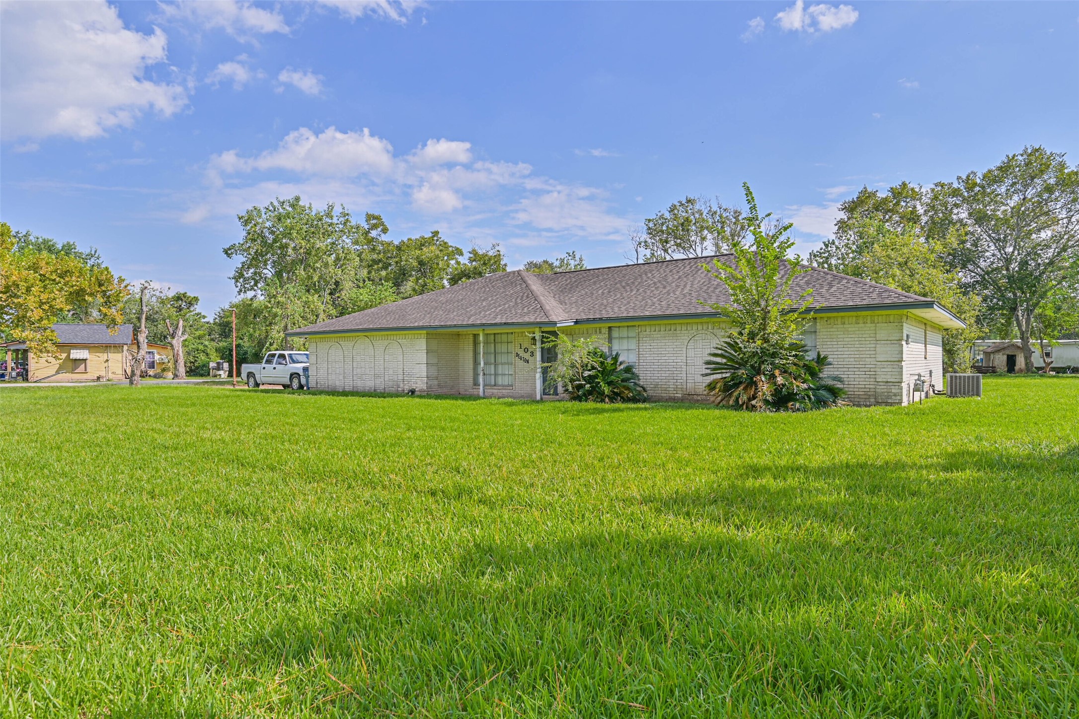 a front view of house with garden