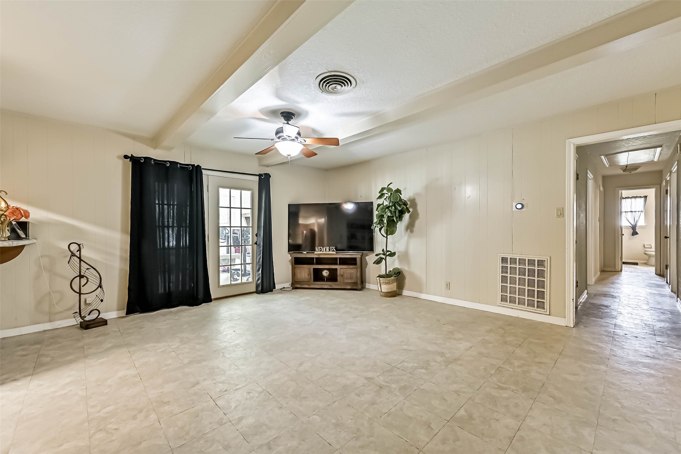 103 Deaton Street Freeport, TX 77541 - Photo 16 of 25 a view of an empty room and a livingroom