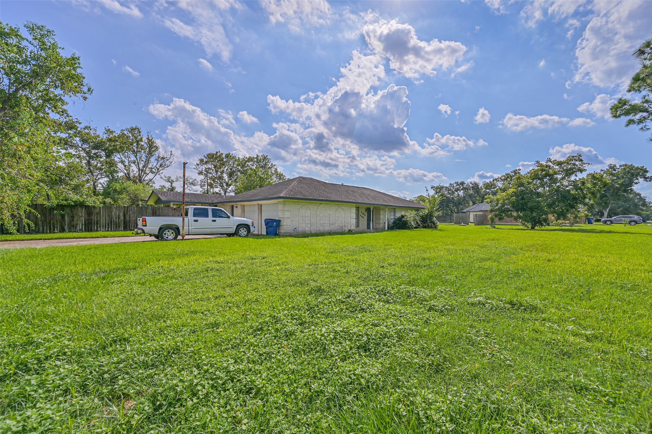 103 Deaton Street Freeport, TX 77541 - Photo 3 of 25 a view of a house with a back yard