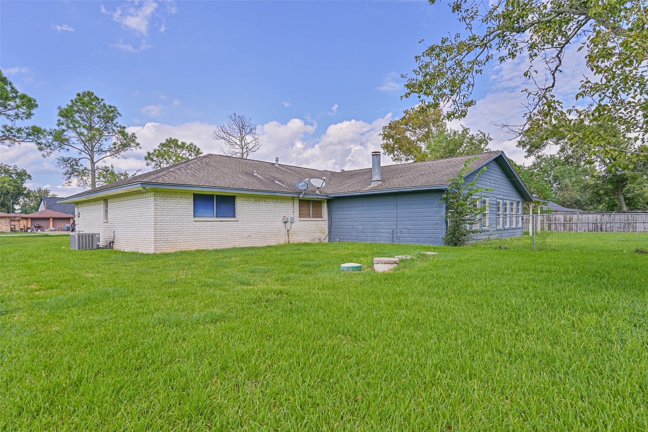 103 Deaton Street Freeport, TX 77541 - Photo 7 of 25 a view of a house with a backyard